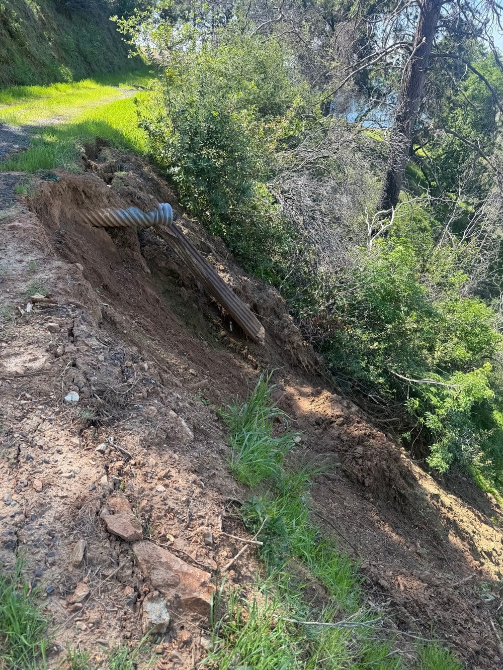 Gallery photos for Landslide Roadway Repair with Retaining Wall and Drainage in Oroville: Image #1